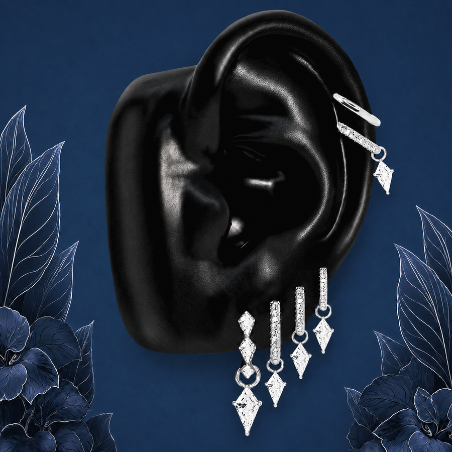 IMBER Luminary Kite earring stack in silver with kite-shaped drops, on ear display