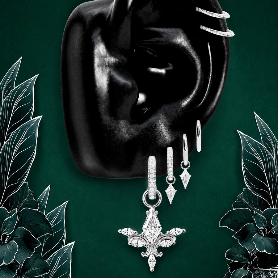 IMBER Seraphic earring stack in silver with angel wing drop and hoops, on ear display