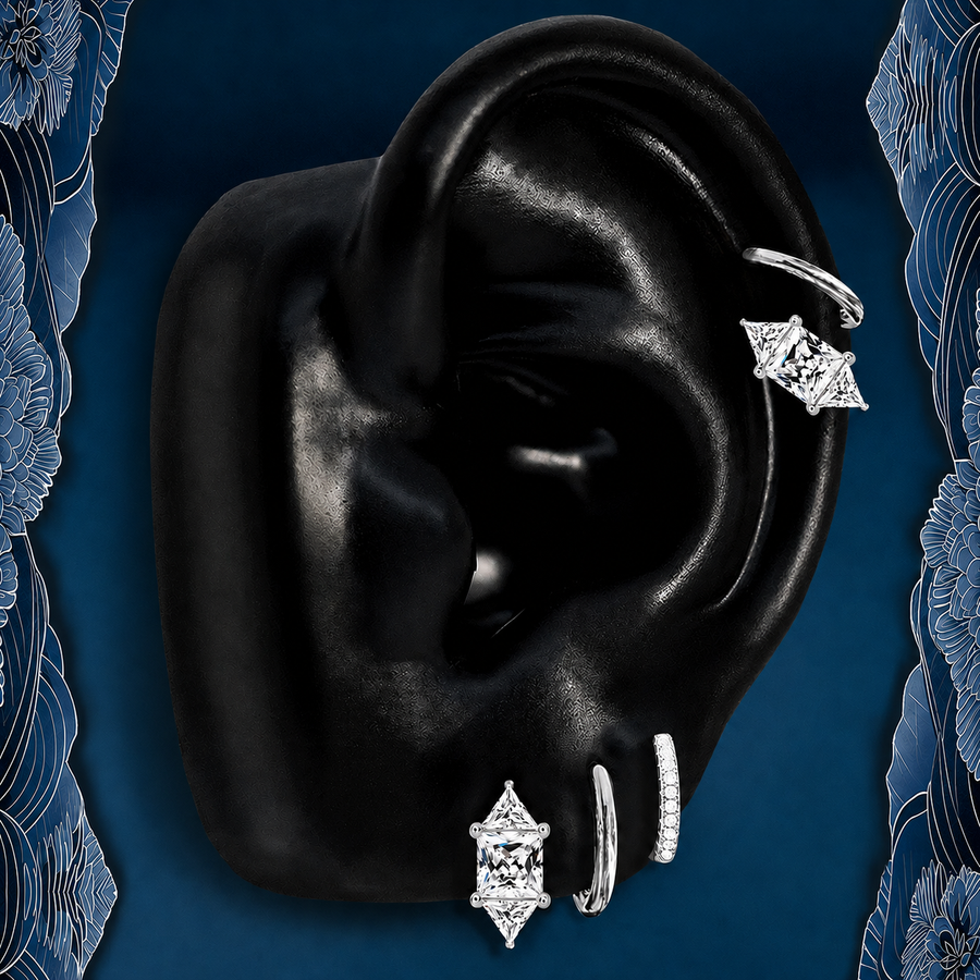 IMBER Timeless earring stack in silver with pavé huggies and crystal studs, on ear display