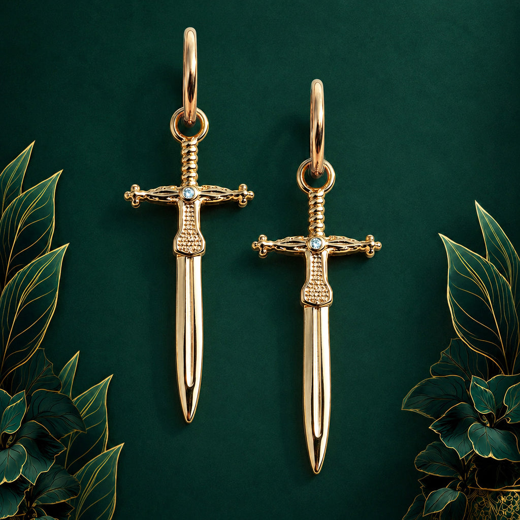 IMBER Ascendant Sword Huggies in gold titanium, pair of sword drop earrings