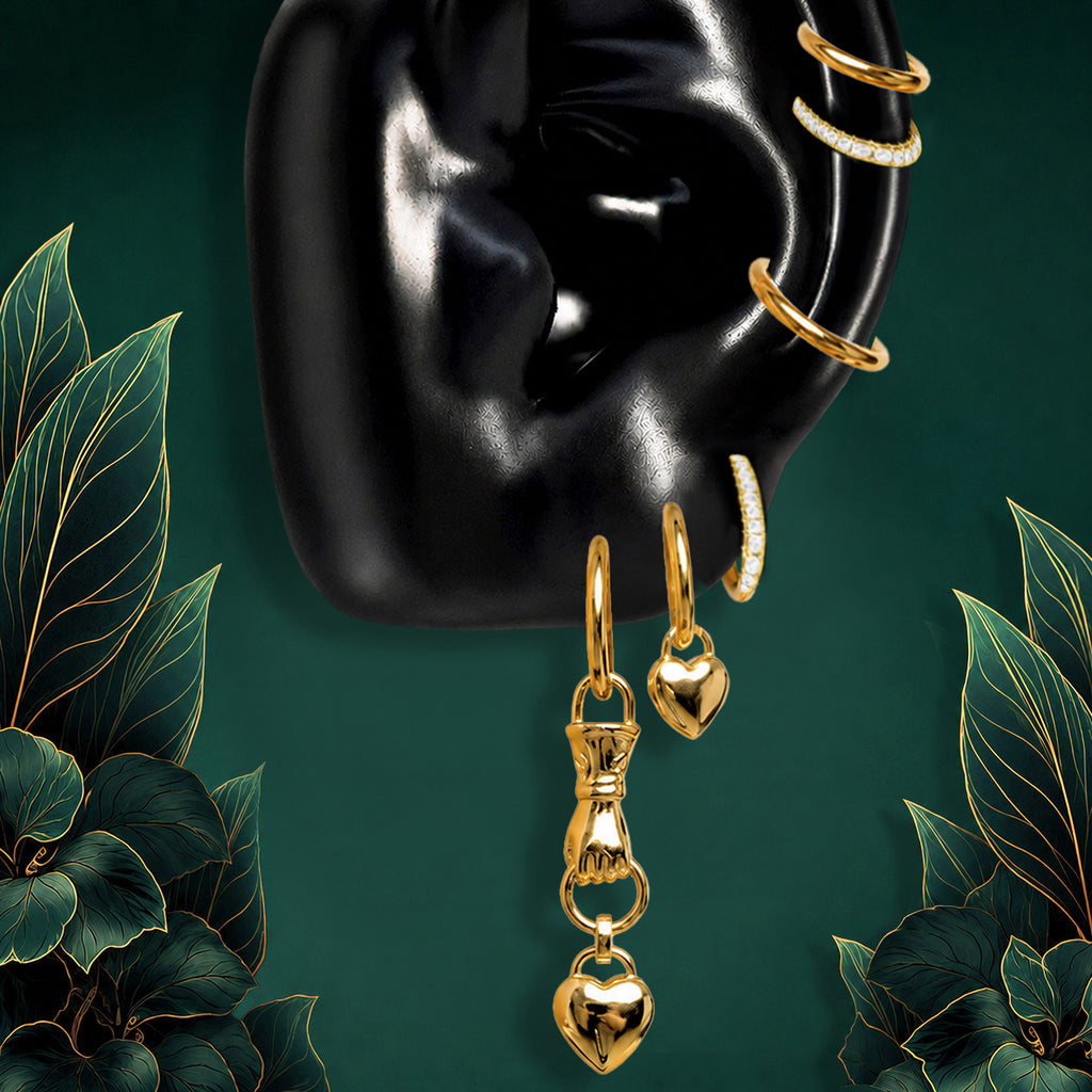 IMBER Beloved earring stack in gold titanium with heart drops and huggies, on ear display