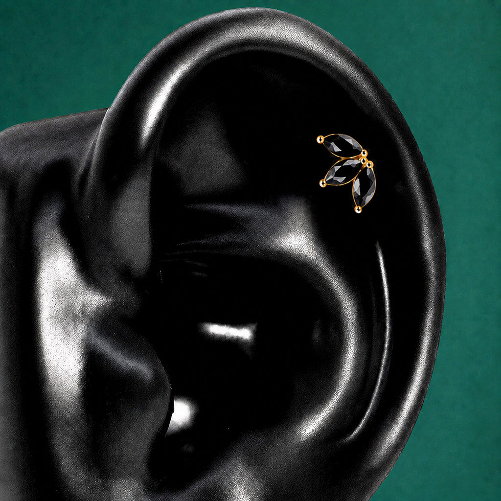 IMBER Bloom Helix/Conch Black marquise stud in gold with black stones, on ear display