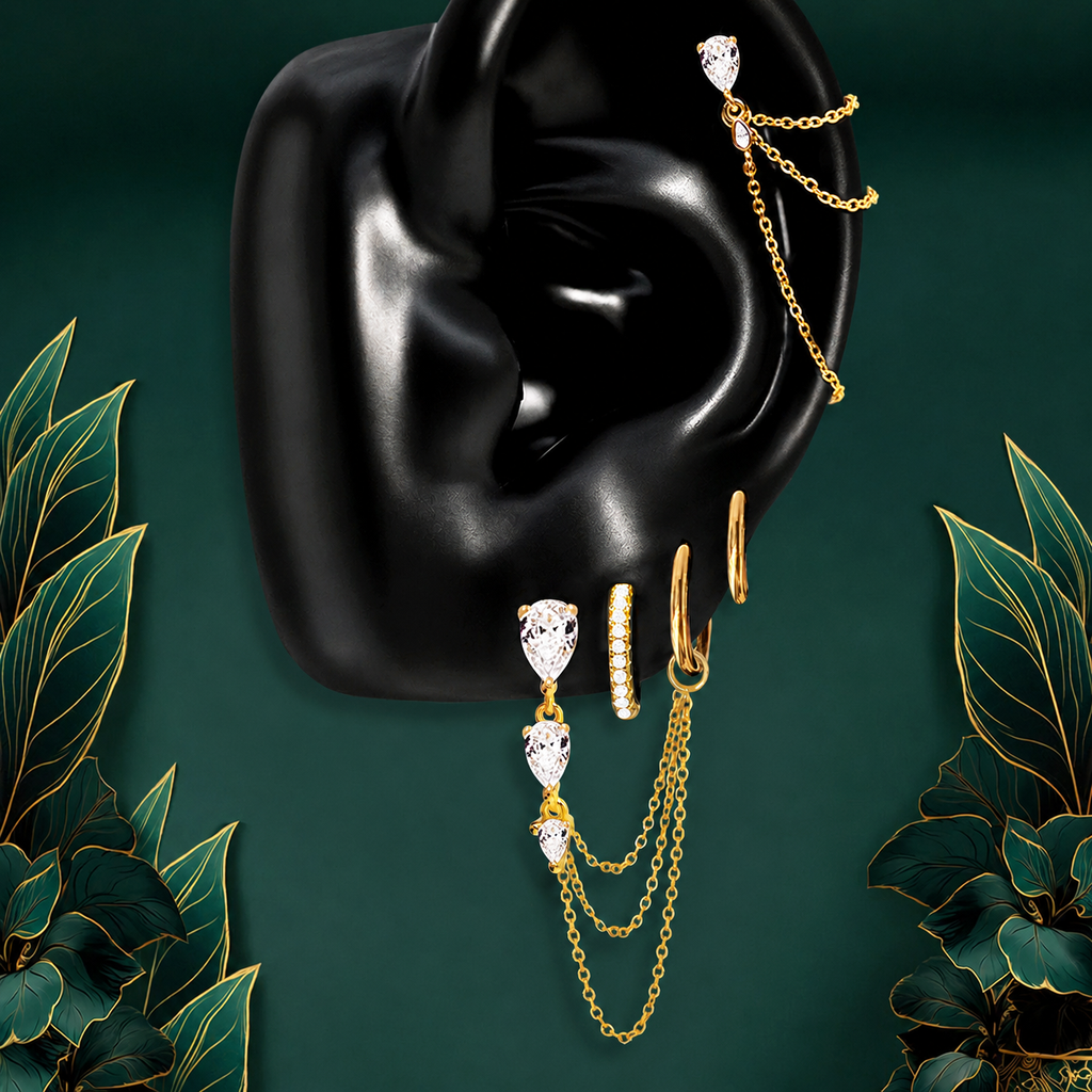 IMBER Brilliant earring stack in gold with pear-cut drop and chains, on ear display
