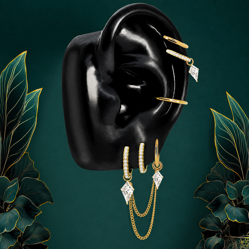 Elysian gold earring stack on a black silicone ear display