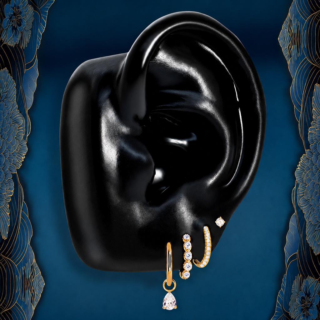 IMBER Emberlit earring stack in gold titanium with crystal huggies and drop, on ear display