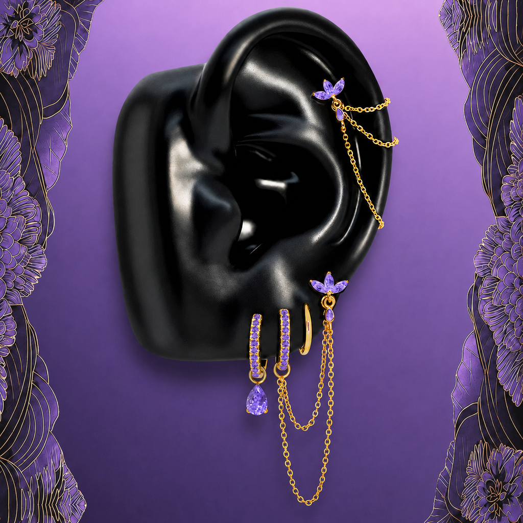 IMBER Eternal Purple earring stack in gold with purple stones and chains, on ear display