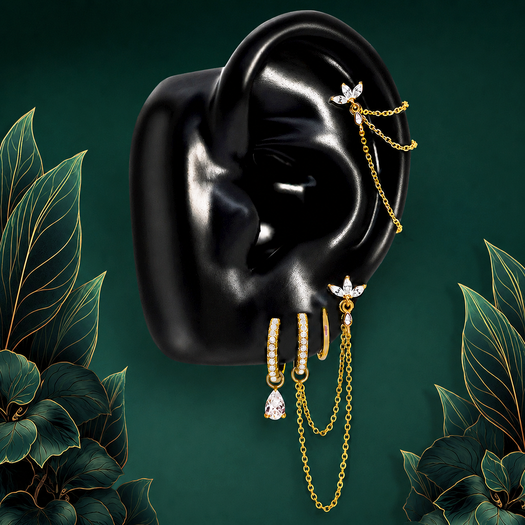 IMBER Eternal White floral earring stack in gold with chains and teardrop, on ear display