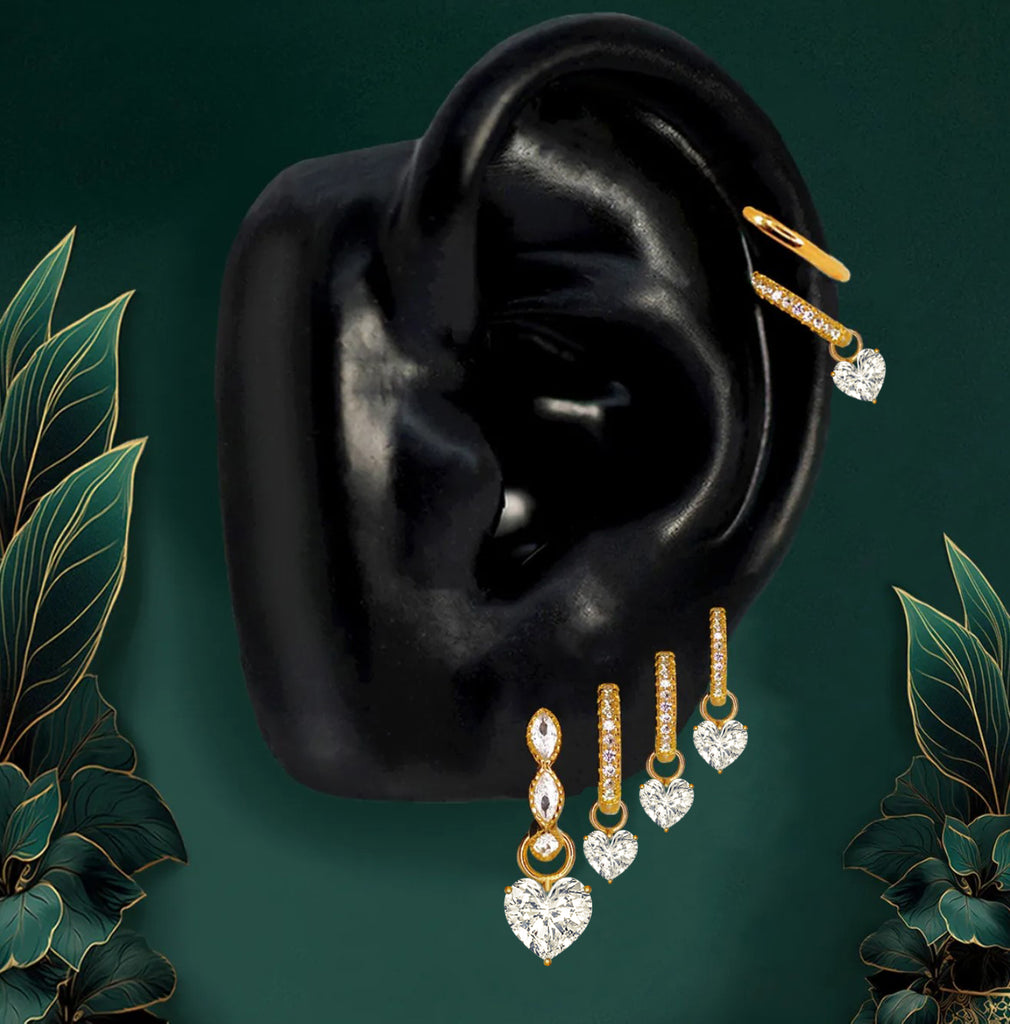 Gold bridal jewelry with heart hoop earrings and pavé hoops