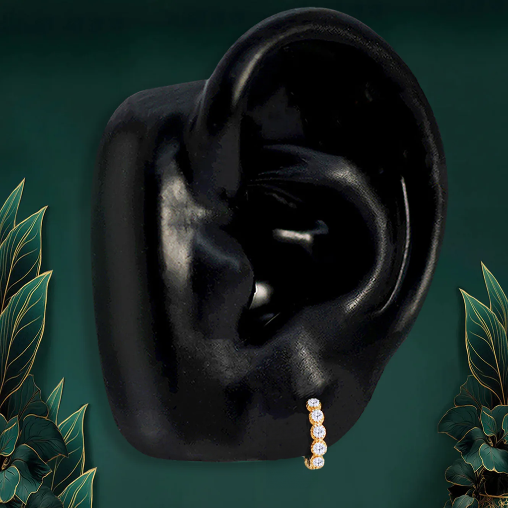 Gold dainty hoop earring with minimal design