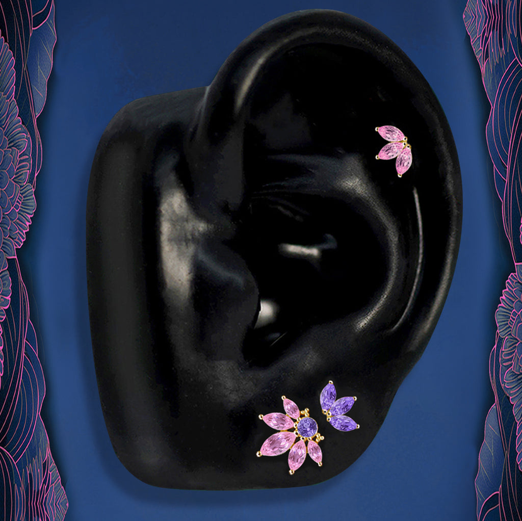 Gold flower stud earrings with pink and purple gemstones