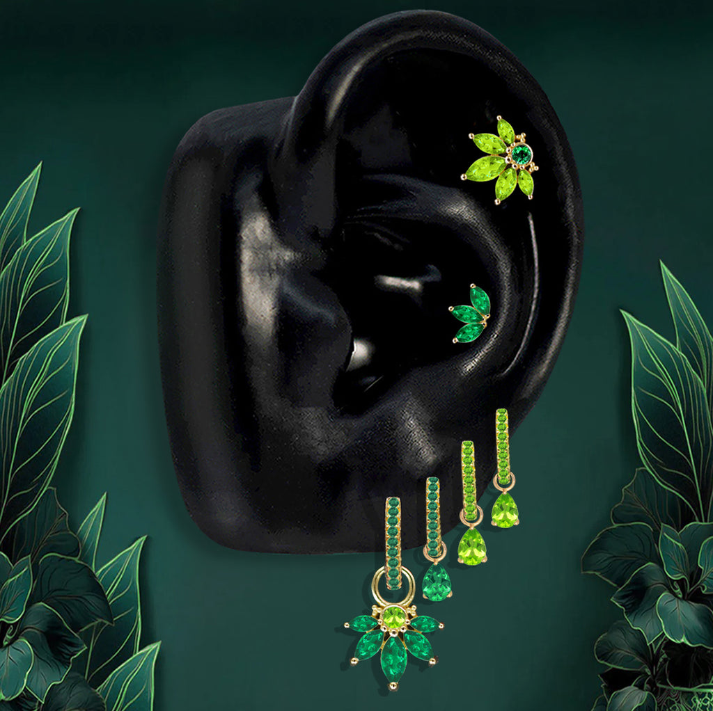 Gold green gemstone earrings with dangling stones