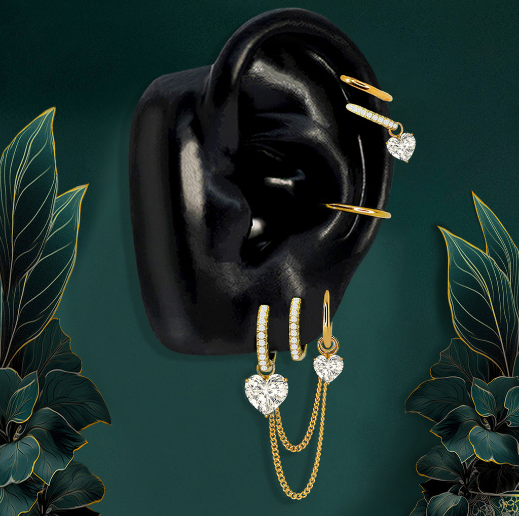 Gold heart earrings with hoops and chains, perfect for wedding jewelry