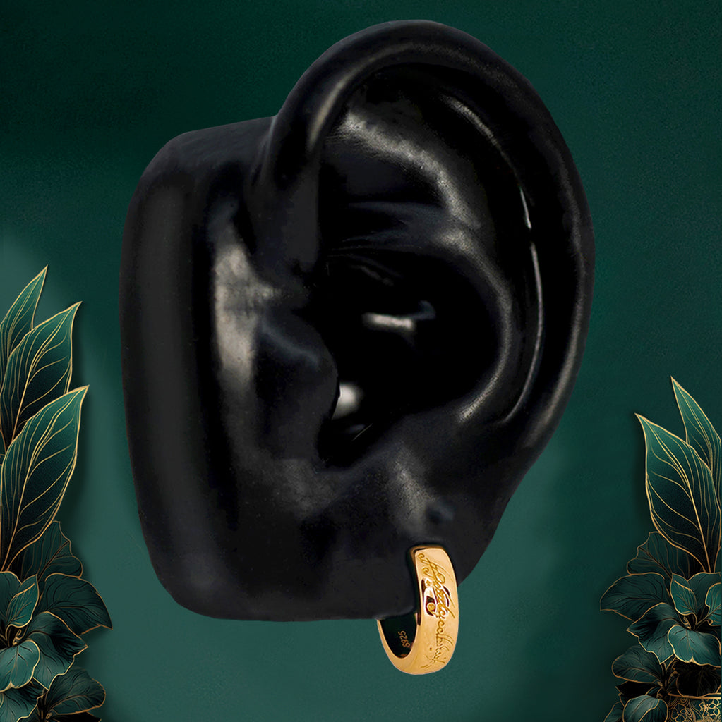 Minimalist gold huggie earrings with sleek, timeless design for everyday wear