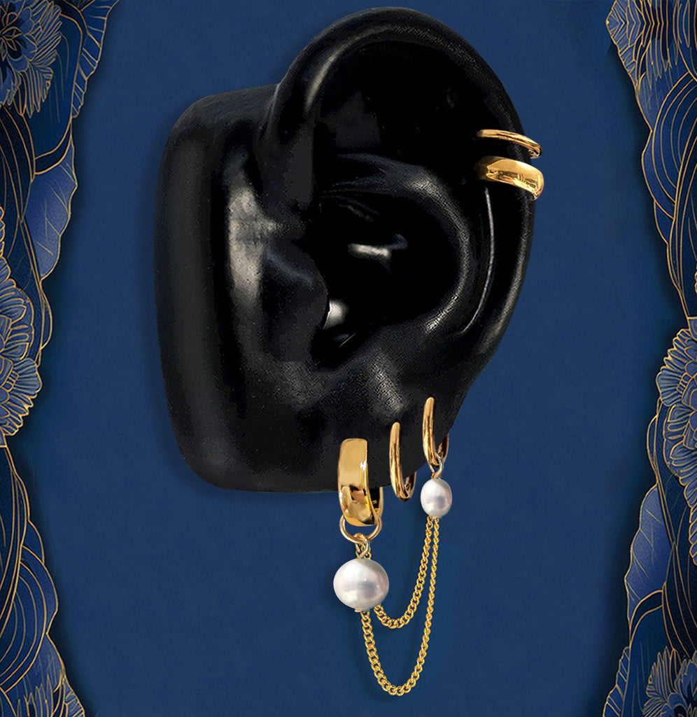 Gold pearl earrings with huggie hoops and chain drops