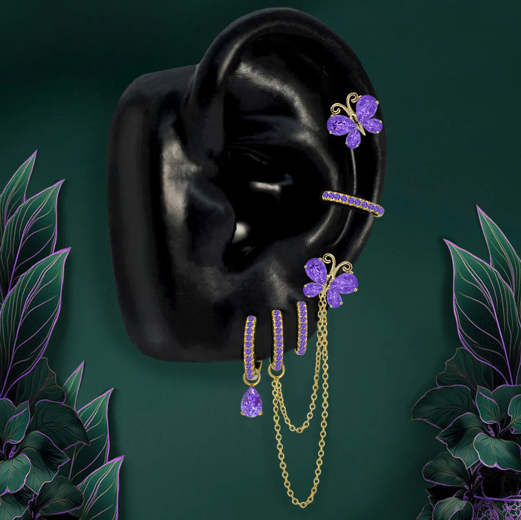 Gold purple butterfly earrings with gemstone wings and chains
