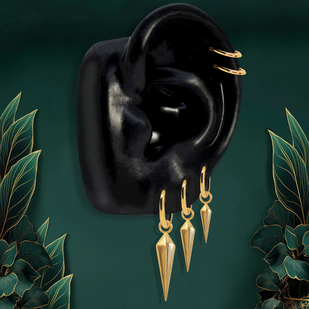 Gold spike earrings with hoop and dangle design