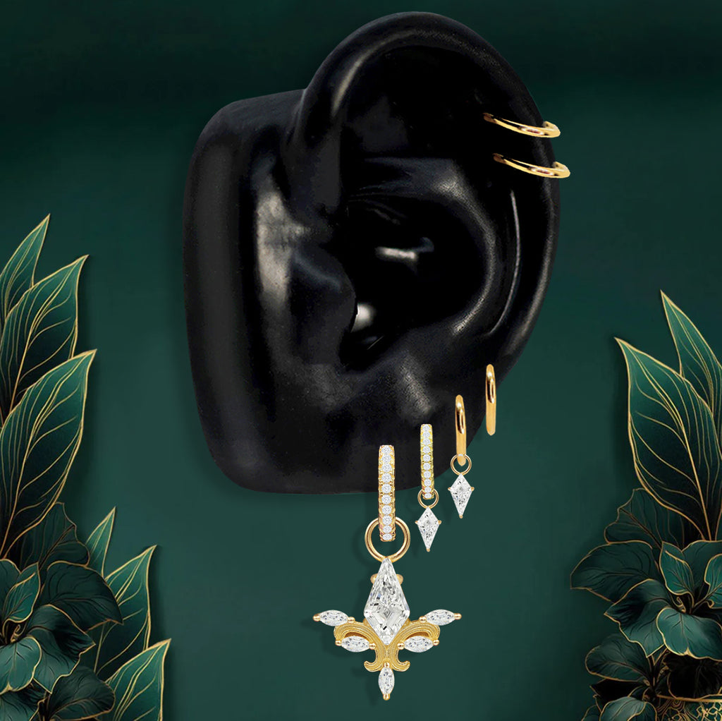 Gold statement earrings stack with bold drops