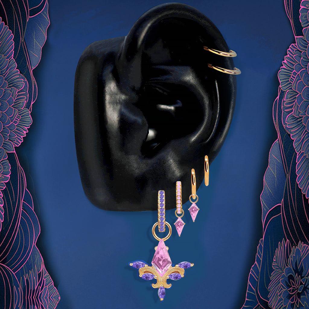 Gold statement earrings bold modern design with pink and purple gems