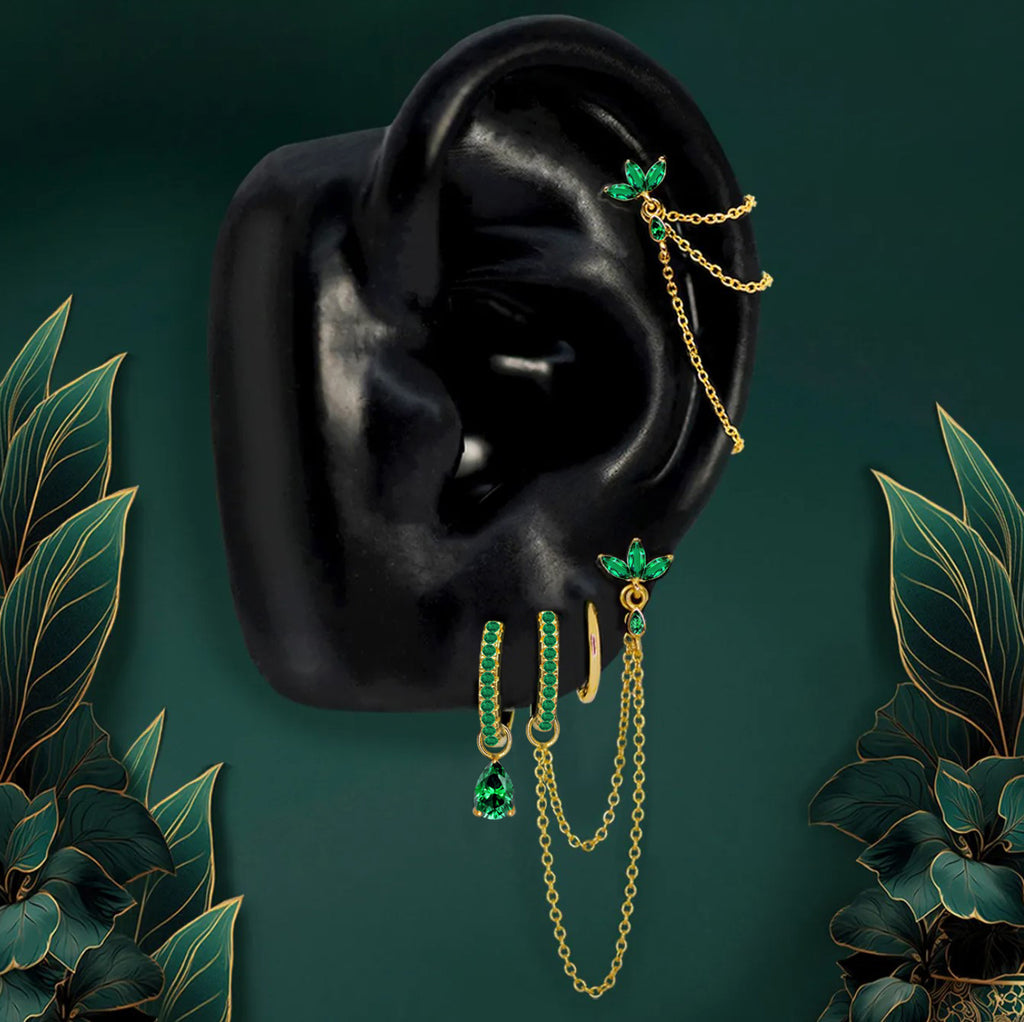 Emerald hypoallergenic earrings styled in a modern earring stack