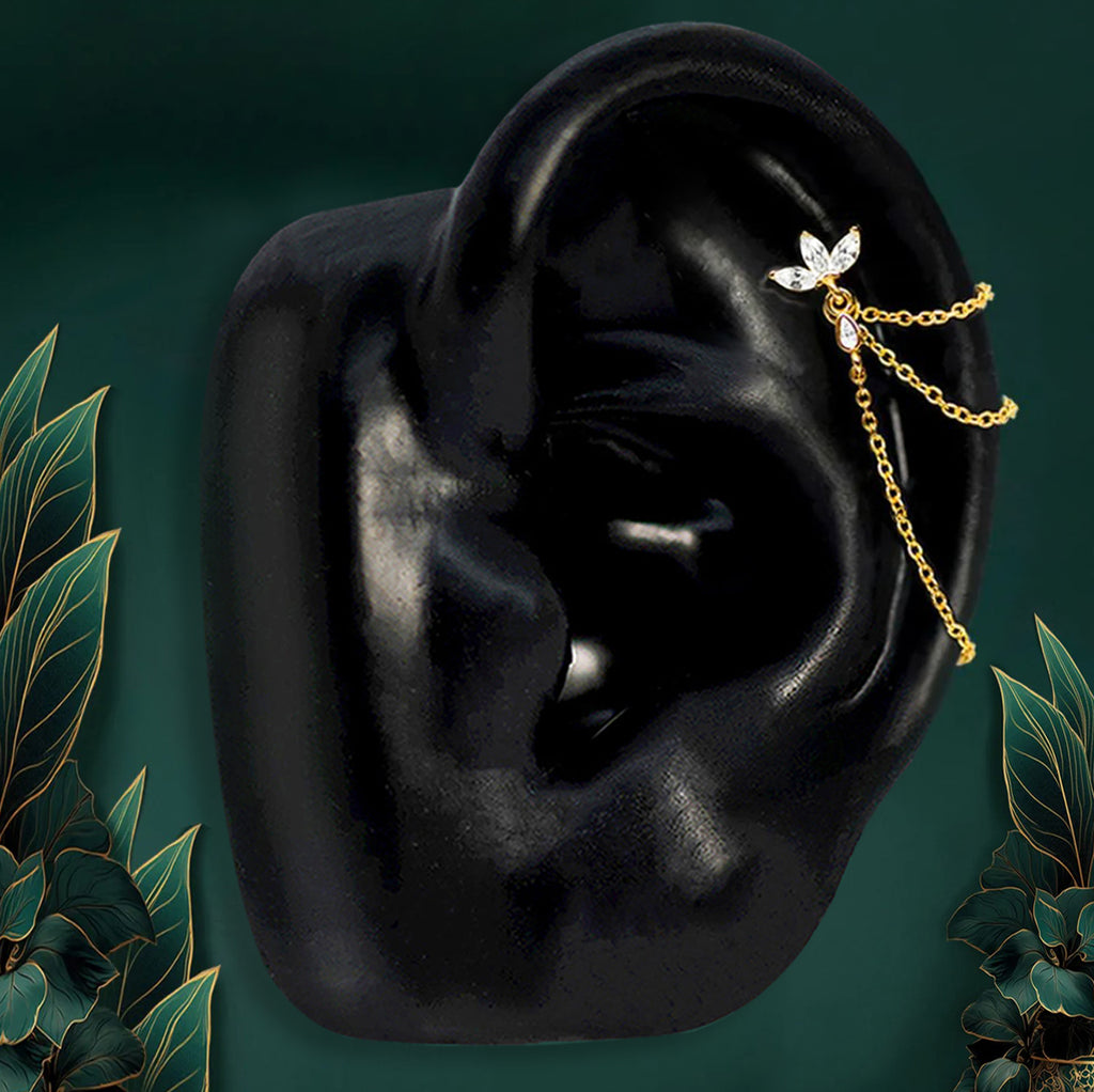 I Am Beaming helix earrings with floral stud and triple chains