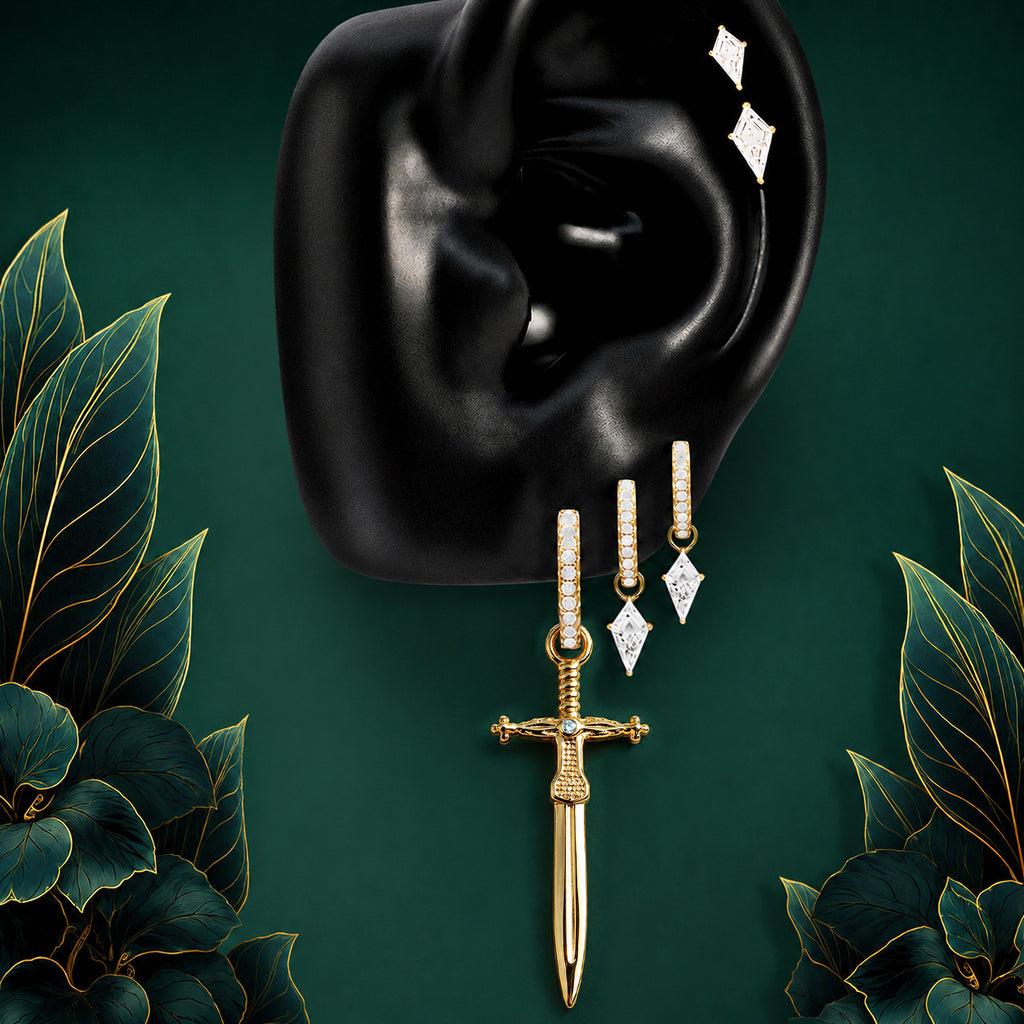 IMBER Lioness earring stack in gold with sword drop and crystal hoops, on ear display