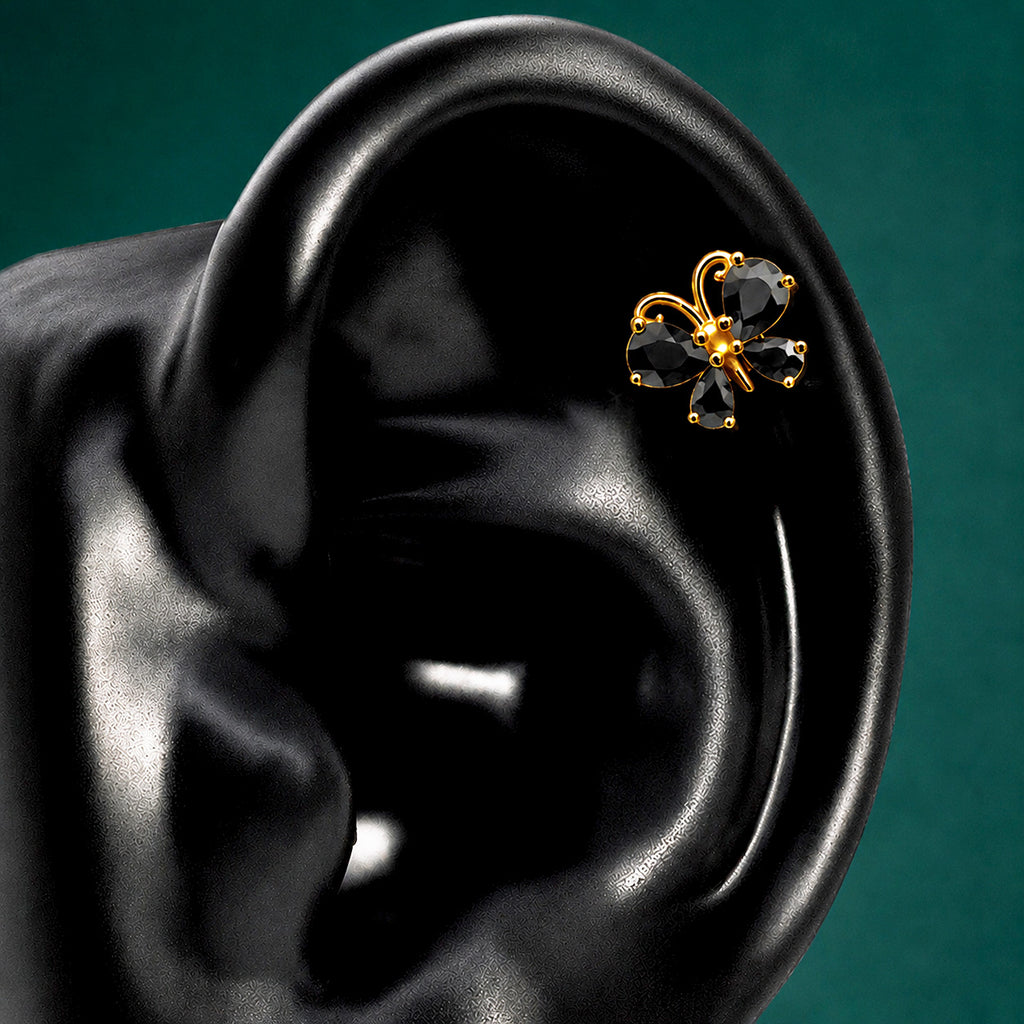 IMBER Metamorphosis Helix/Conch Black butterfly stud in gold with black stones, on ear display
