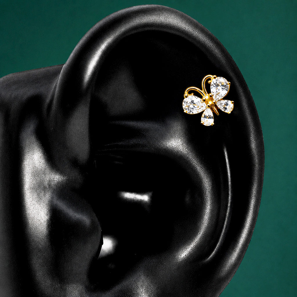 IMBER Metamorphosis Helix/Conch White butterfly stud in gold with white stones, on ear display