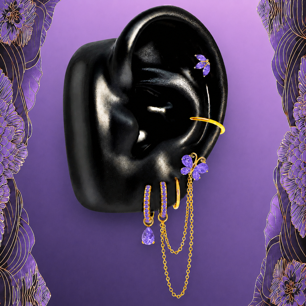 IMBER Metamorphosis Purple earring stack in gold sterling silver with purple butterflies, on display