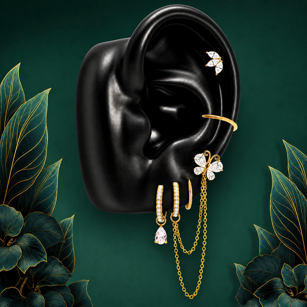 IMBER Metamorphosis White earring stack in gold with butterfly and chains, on ear display