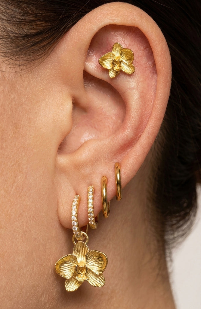 IMBER Orchid Ear Stack Set in gold with orchid drop, worn on model's ear