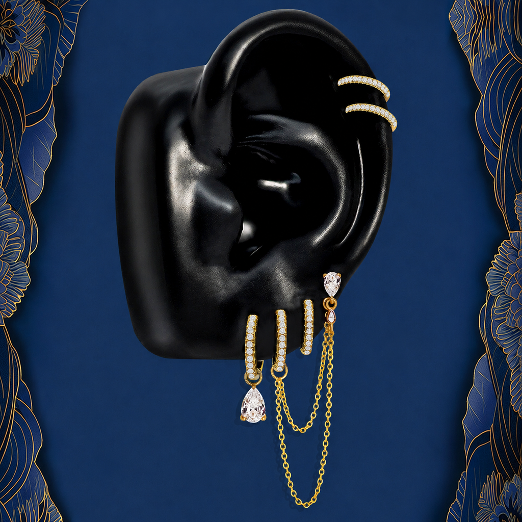 IMBER Reign earring stack in gold with double chain and teardrop, on ear display