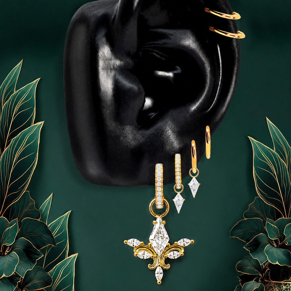 IMBER Seraphic earring stack in gold with angel wing drop and hoops, on ear display