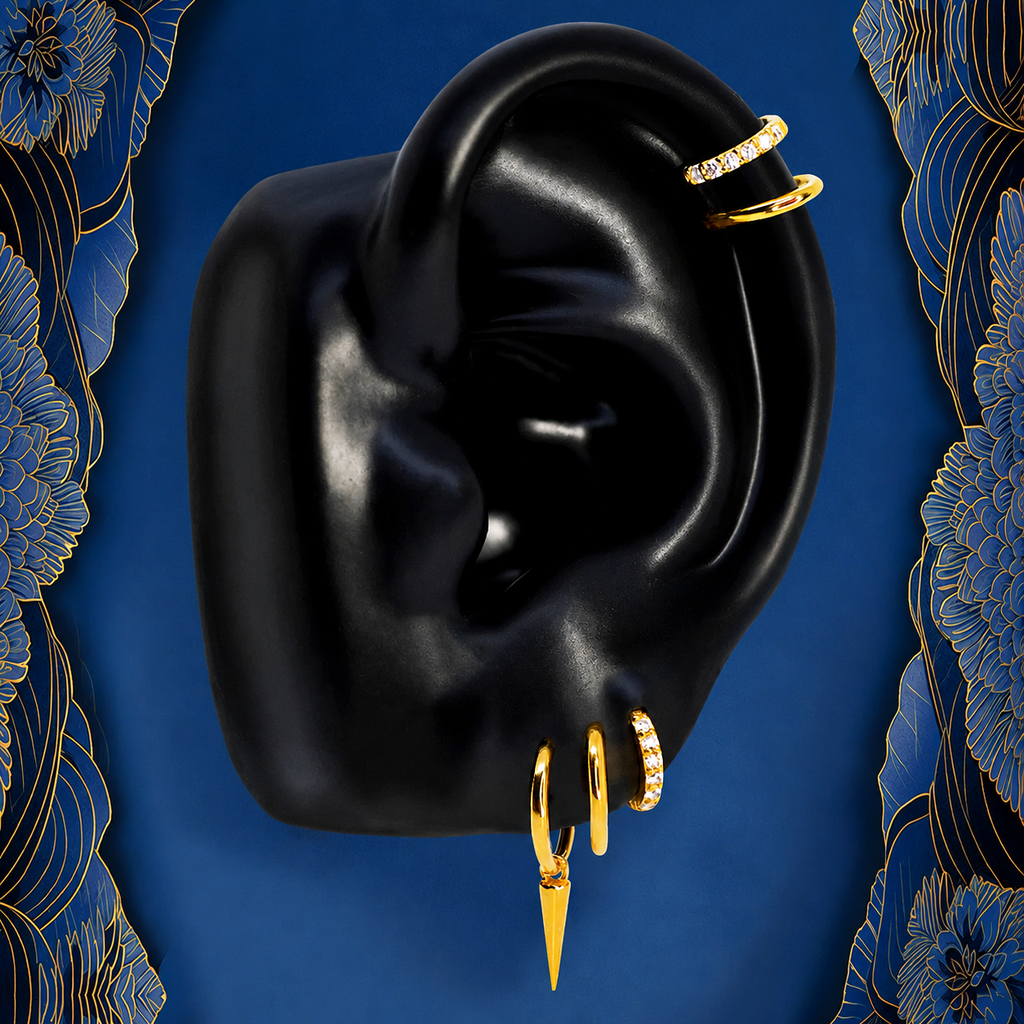IMBER Solace earring stack in gold titanium with spike huggies, on ear display