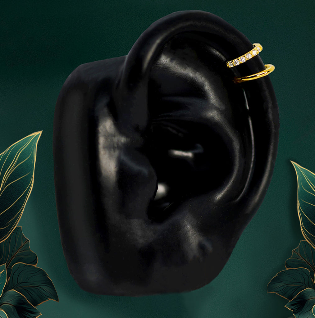IMBER Solace Helix Duo gold titanium huggie hoops stacked on upper ear display