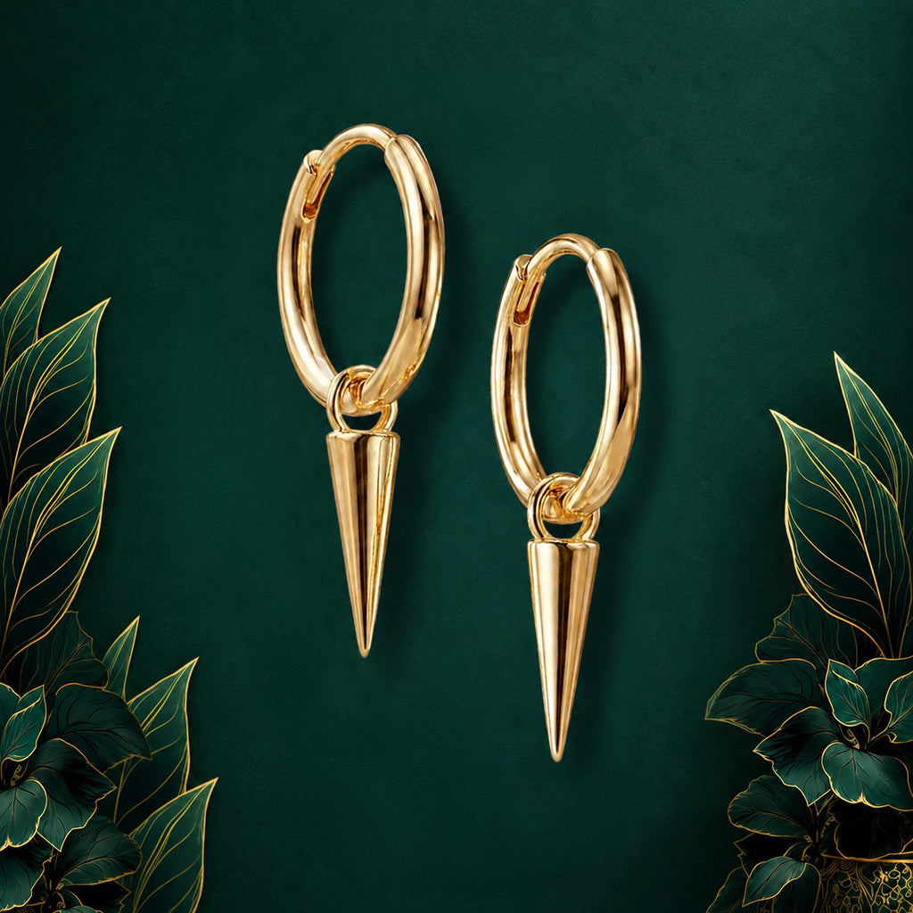 IMBER Solace Spike Huggies in gold, pair of spike charm huggie earrings, close-up