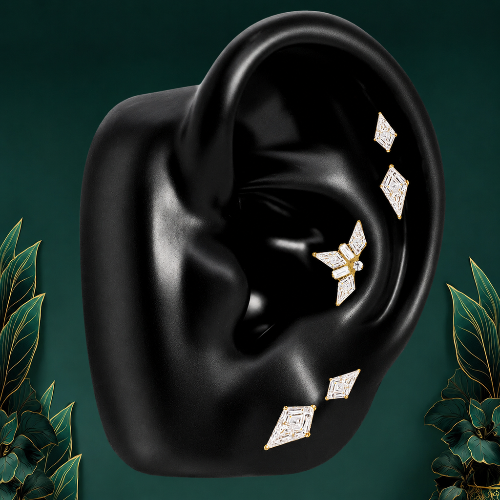 IMBER Vestige flat back stud earring stack in gold with kite-cut studs, on ear display